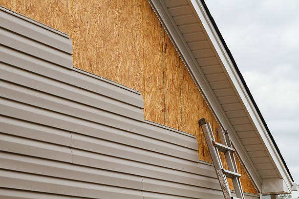 Professional Emergency Siding Repair technician working in Mason, OH